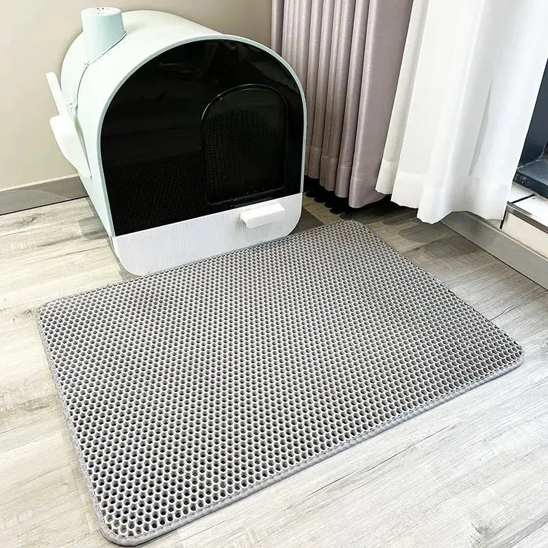 Tapis litière anti-dispersion™