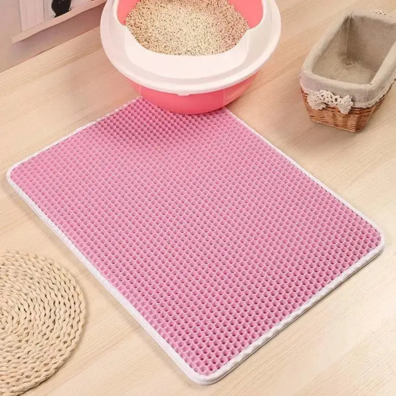 Tapis litière anti-dispersion™